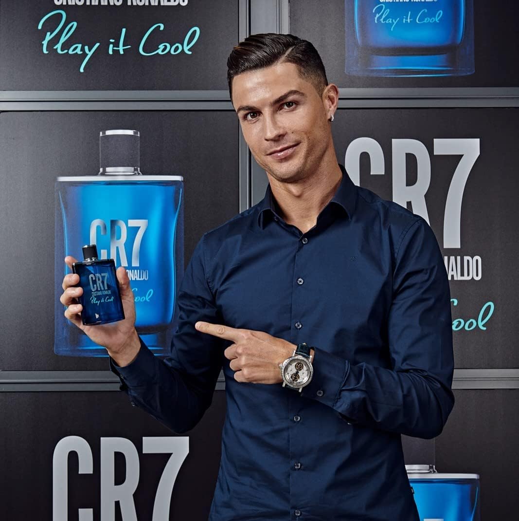 CR7 Cristiano Ronaldo Play It Cool Eau De Toilette: A light, fresh, and utterly unique fragrance for men. Delicate and sophisticated, this aromatic fragrance with herbal and citrus notes is perfect for the active man full of energy. Ideal for everyday wear.