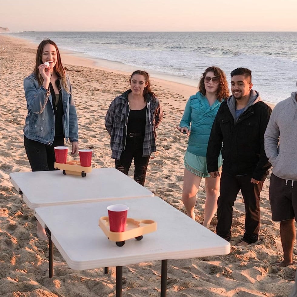 BRUU Moving Beer Pong Robot - A small robot that adds excitement to your beer pong games. It drives around the table, making the cups a moving target. Custom sensors ensure it stays on track without falling off or hitting anything. Easy to use - just add cups, fill them up, and turn it on. Let the good times roll! This model offers 3 different speeds. Each box contains 1 Robot, 2 Ping Pong Balls, and 1 Quick start guide. Spice up your traditional beer pong matches with this great invention.