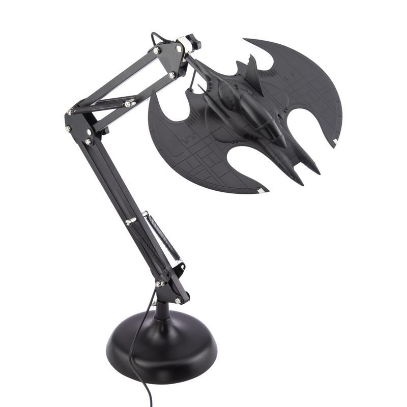 Black desk lamp with bat-shaped design inspired by Batman's aircraft. Posable for adjustable lighting. Perfect for Batman fans and Gotham decor.